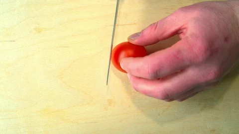 Cherry slice on wooden Board Stock Footage 72546868
