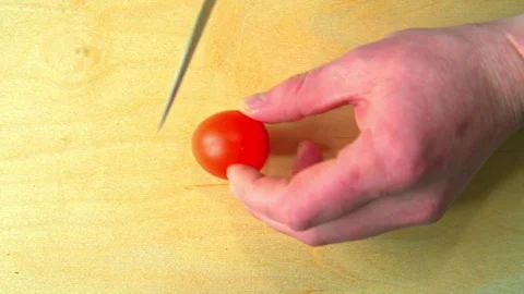 Cherry slice on wooden Board Stock Footage 72548918