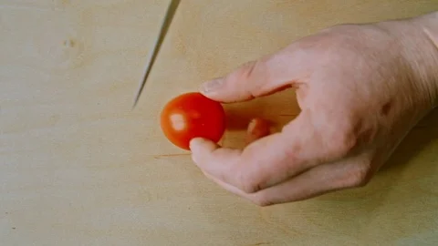Cherry slice on wooden Board Stock Footage