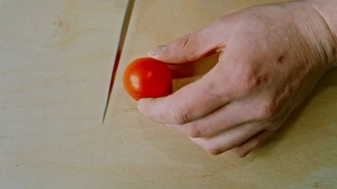 Cherry slice on wooden Board 库存影片 73372164
