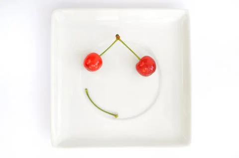 Cherry smile Stock Photos