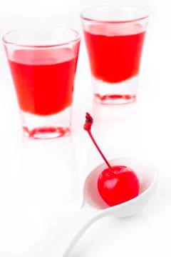 Cherry in spoon Stock Photos