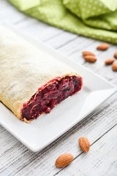 Cherry strudel with almond Stock Photos
