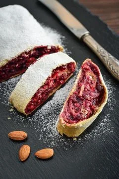 Cherry strudel with almond Stock Photos