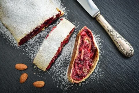 Cherry strudel with almond Stock Photos