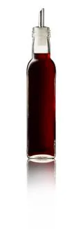 Cherry Syrup bottle on white background with reflection. Stock Photos
