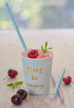 Cherry syrup with ice Free Stock Photos