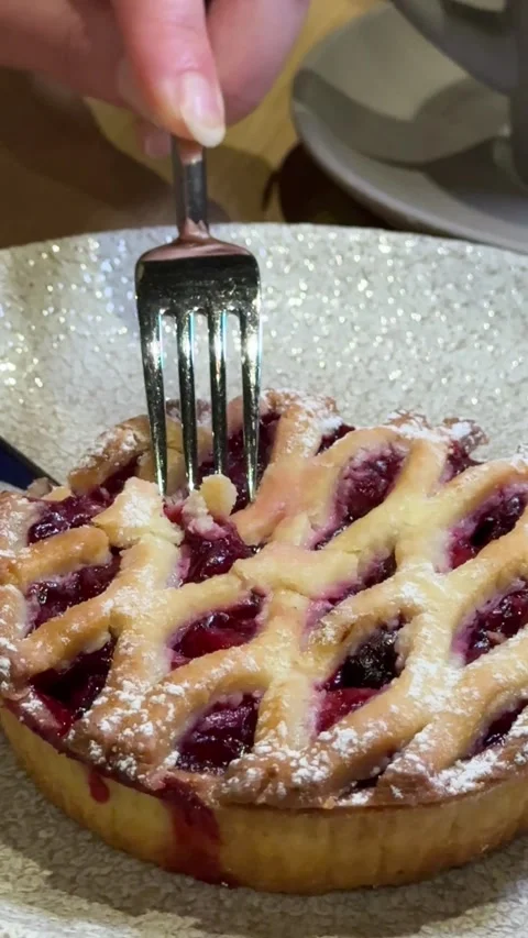 Cherry tart Apple pice cake preparation series woman slicing pie on a table - Stock Footage 323795367