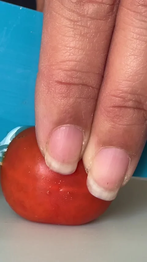 Cherry tomato cutting approach. Stock Footage 287860229