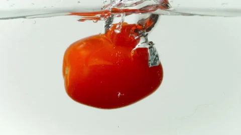 Cherry Tomato falls into Water Super Slow Motion Stock-Footage 247343554