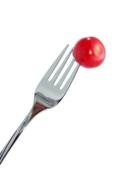 Cherry Tomato On Fork Stock Photos