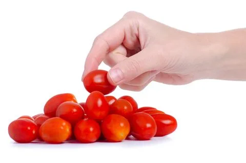 Cherry tomato organic in hand Stock Photos