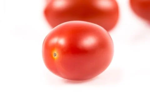 Cherry tomato on white Stock Photos