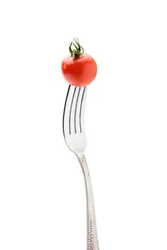 Cherry tomatoe on fork Stock Photos