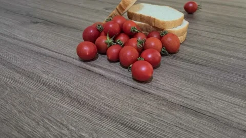 Cherry tomatoes and bread for bruschetta Stock Footage 160674887