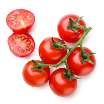 Cherry tomatoes and halves close-up on a white background. Top view Stock Photos