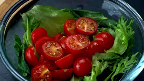 Cherry tomatoes and salad Stock Footage 149124545