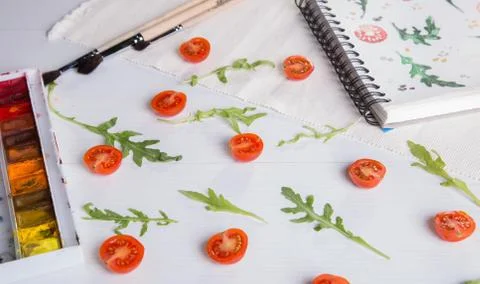 Cherry tomatoes ans arugula Stock Photos
