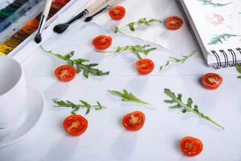 Cherry tomatoes ans arugula Stock Photos