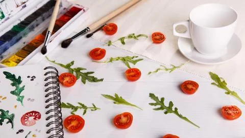 Cherry tomatoes ans arugula Stock Photos