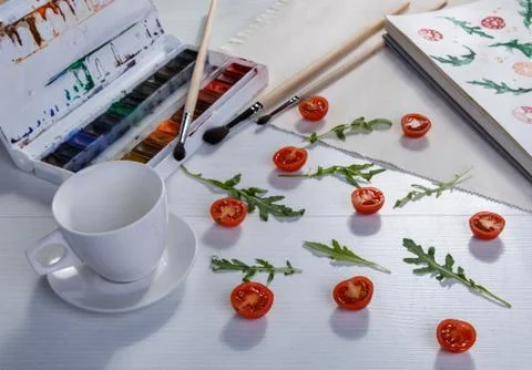 Cherry tomatoes ans arugula Stock Photos