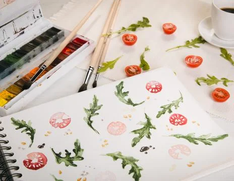 Cherry tomatoes ans arugula Stock Photos