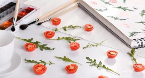 Cherry tomatoes ans arugula Stock Photos