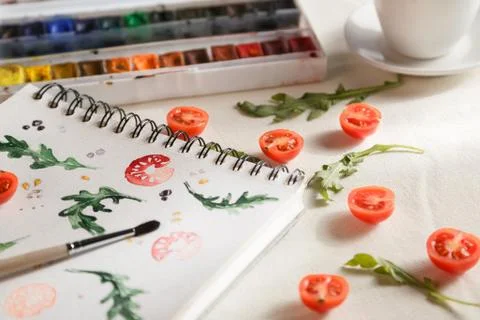 Cherry tomatoes ans arugula Stock Photos