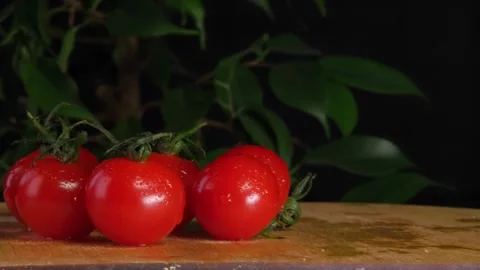 Cherry tomatoes are lying in the kitchen, cherry tomatoes are cut into salad Stock Footage 264884624