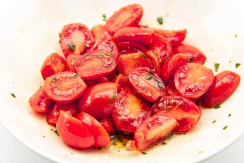 Cherry tomatoes with basil and balsamic vinegar Stock Photos