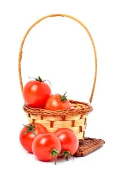 Cherry tomatoes in the basket Stock Photos