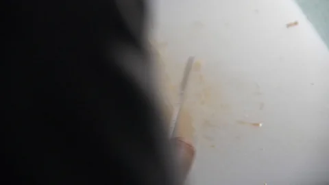 Cherry Tomatoes being sliced in slow motion. Stock Footage 128688687