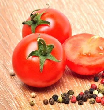 Cherry tomatoes with black pepper Stock Photos