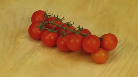 Cherry tomatoes on a branch Stock Footage 181967897