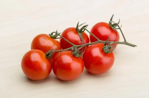 Cherry tomatoes branch Stock Photos