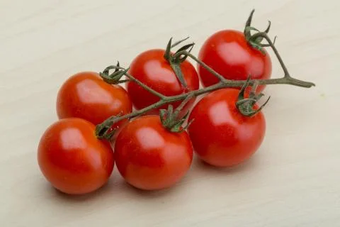 Cherry tomatoes branch Stock Photos