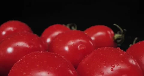 Cherry tomatoes close-up, Motion. Rotation. Stock Footage 234544303