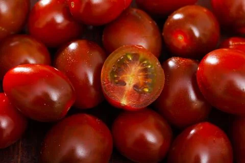 Cherry tomatoes, close-up view Stock Photos