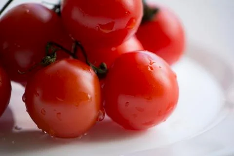 Cherry tomatoes closeup Stock Photos