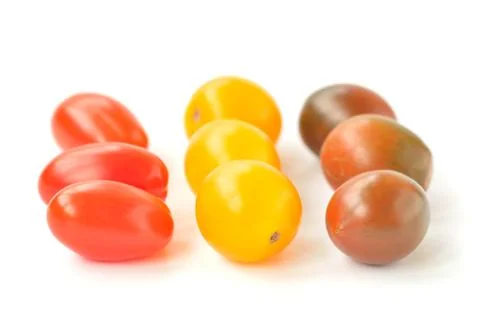 Cherry tomatoes of different colors Stock Photos