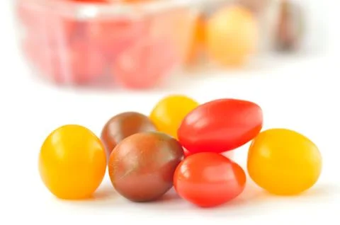 Cherry tomatoes of different colors Stock Photos