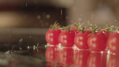 Cherry tomatoes fall on glass RAPID 100fps (FEW SHOTS) Stock Footage 74651520