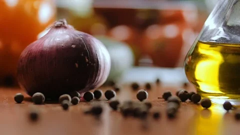 Cherry tomatoes fall on the kitchen table. Stock Footage 75959104