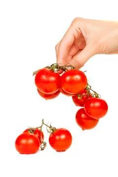 Cherry tomatoes in hand Foto stock