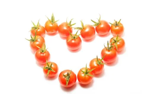 Cherry tomatoes heart shape Stock Photos