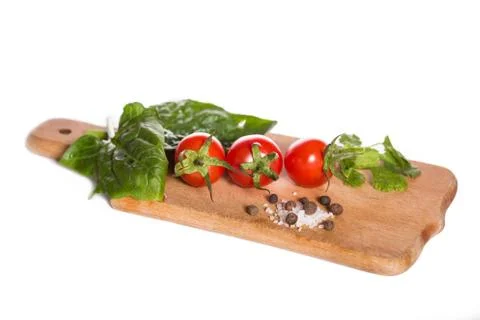 Cherry tomatoes with herbs Foto stock