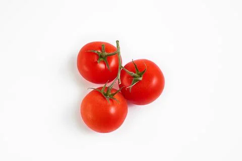Cherry tomatoes isolated over white background Stock Photos