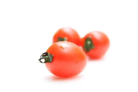 Cherry tomatoes isolated on white background Stock Photos