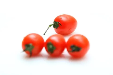 Cherry tomatoes isolated on white background Stock Photos