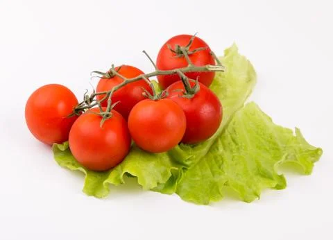 Cherry tomatoes isolated on white background Stock Photos